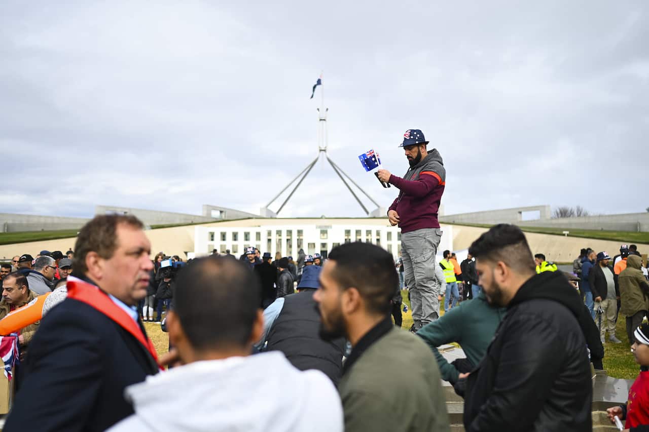 A visa protection protest held at Parliament House (AAP).jpg