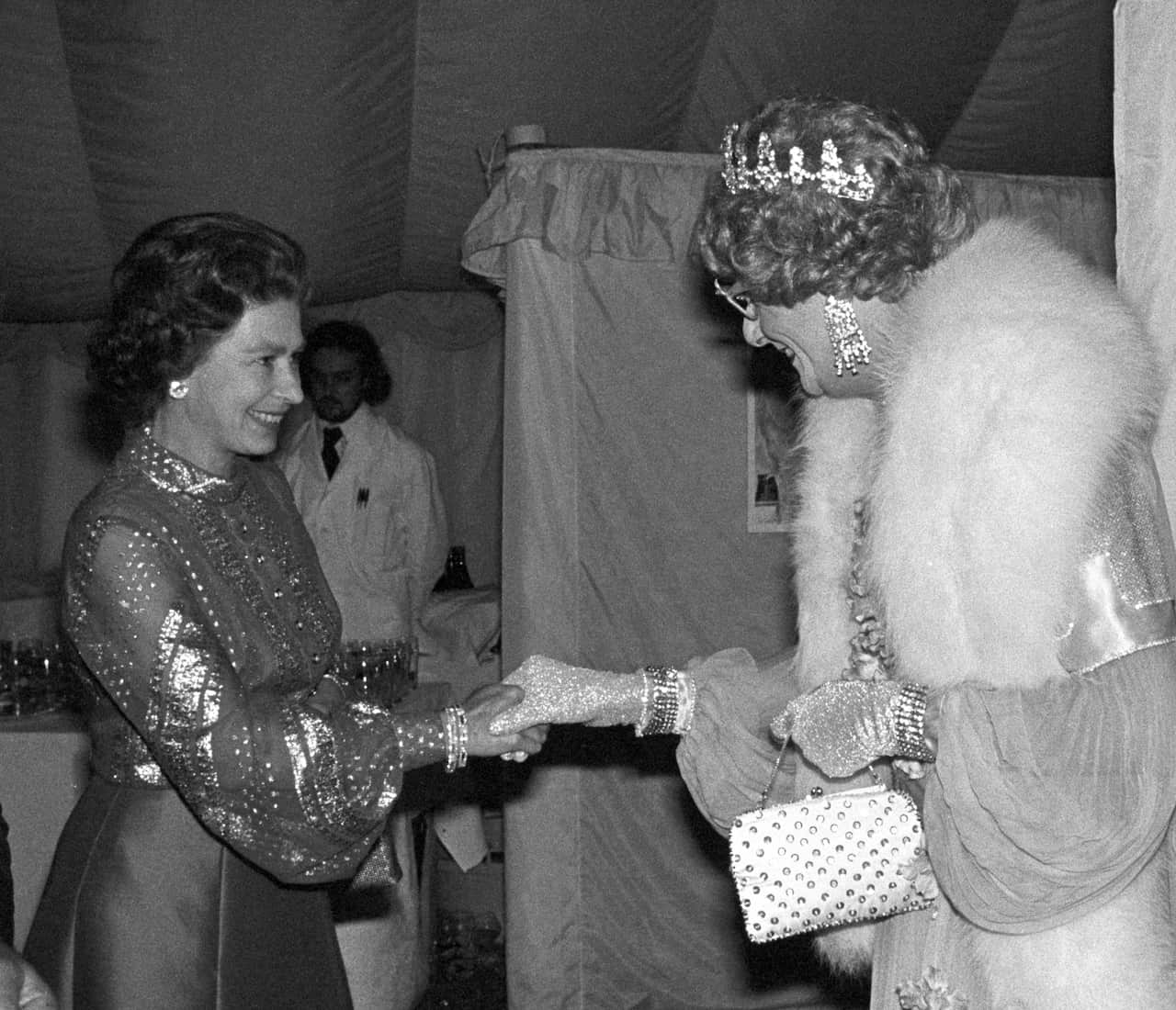 Dame Edna Everage with Queen Elizabeth II