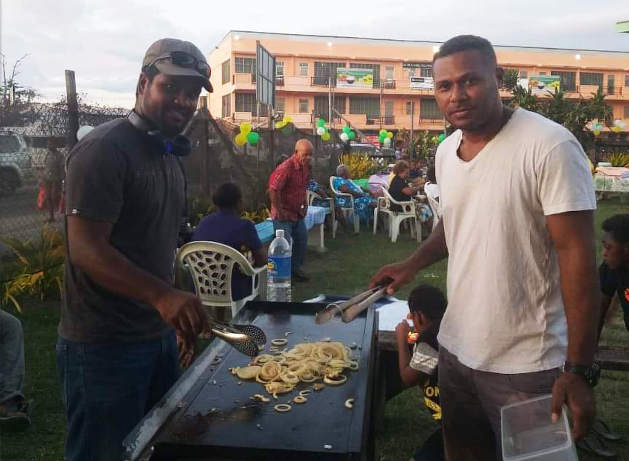 Raziv Hilly and Charles Noda at a previous BBQ.