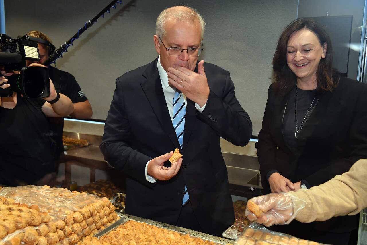 Scott Morrison eating pastry