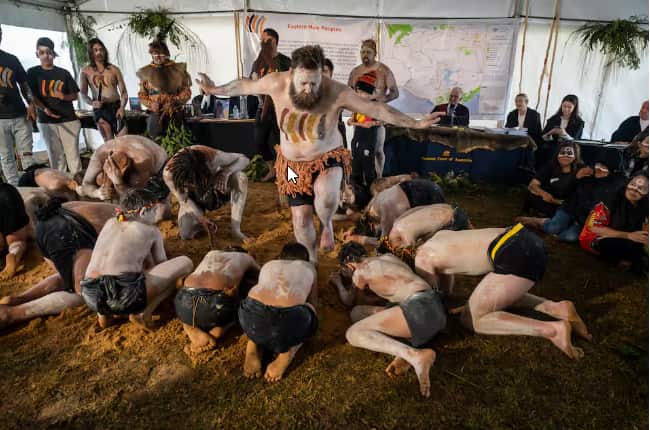 Kooyang Parreeyt Maar performing a dance at a ceremony celebrating a native title decision at Logans Beach, Warrnambool..png