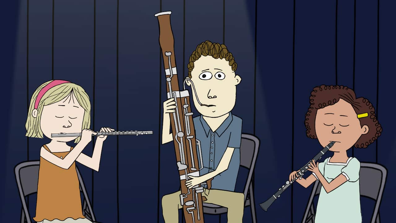 A cartoon with a girl playing the flute, another clarinet and a boy in the middle with a bassoon