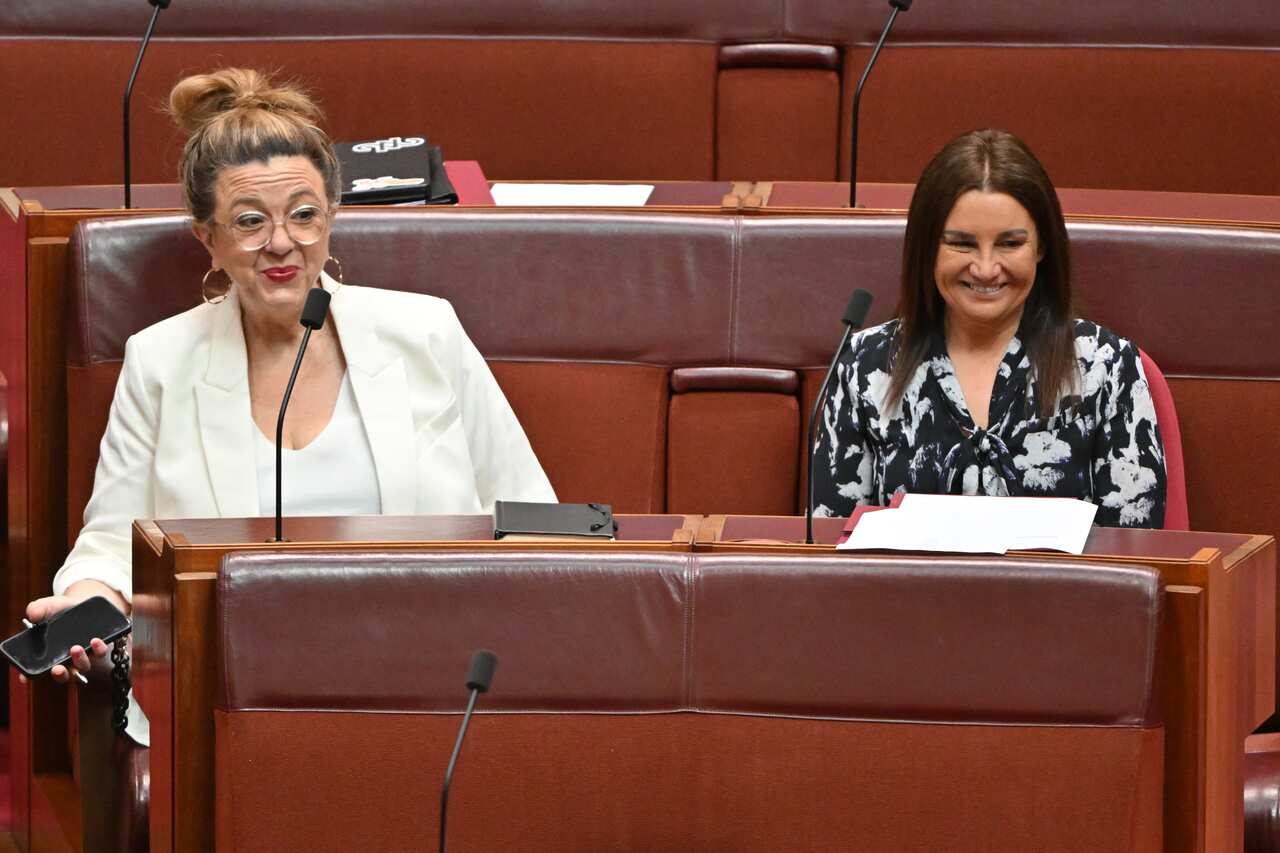 Two women sitting in the Senate