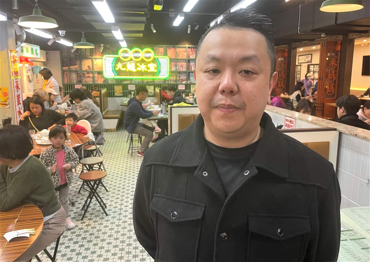 Howin Chui standing at his Kowloon restaurant in Sydney.