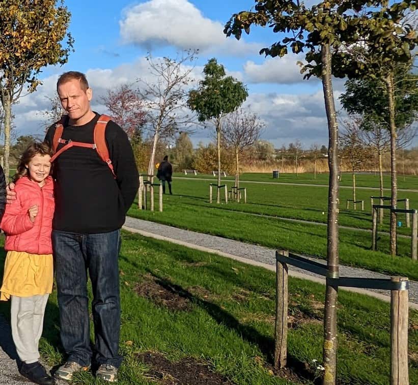 Paul Guard stands with his daughter Emma at the MH17 memorial in the Netherlands.