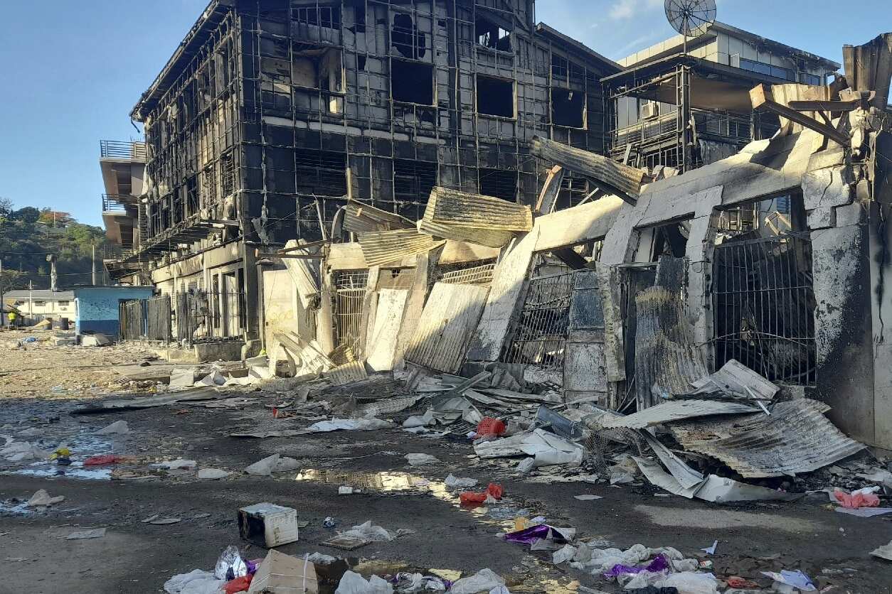 A looted street in Honiara's Chinatown, Solomon Islands, after riots on 27 November 2021.