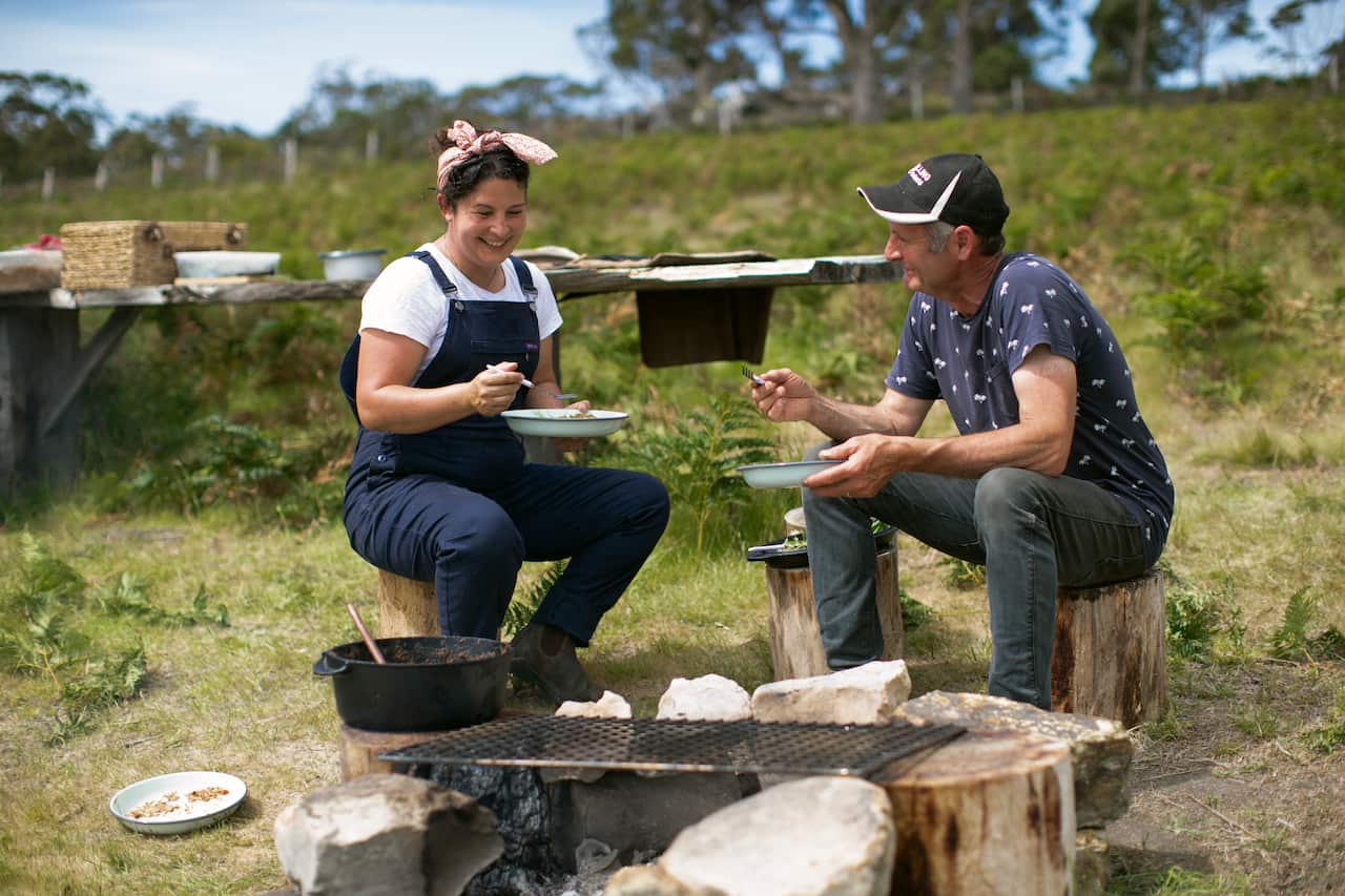 Analiese and Richard eating wallaby in the wild - A Girl's Guide to Hunting, Cooking and Wild Fishing Season 2