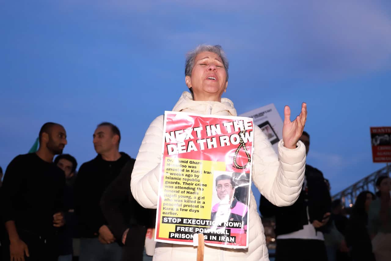 Woman mourning for people who recently were executed in Iran