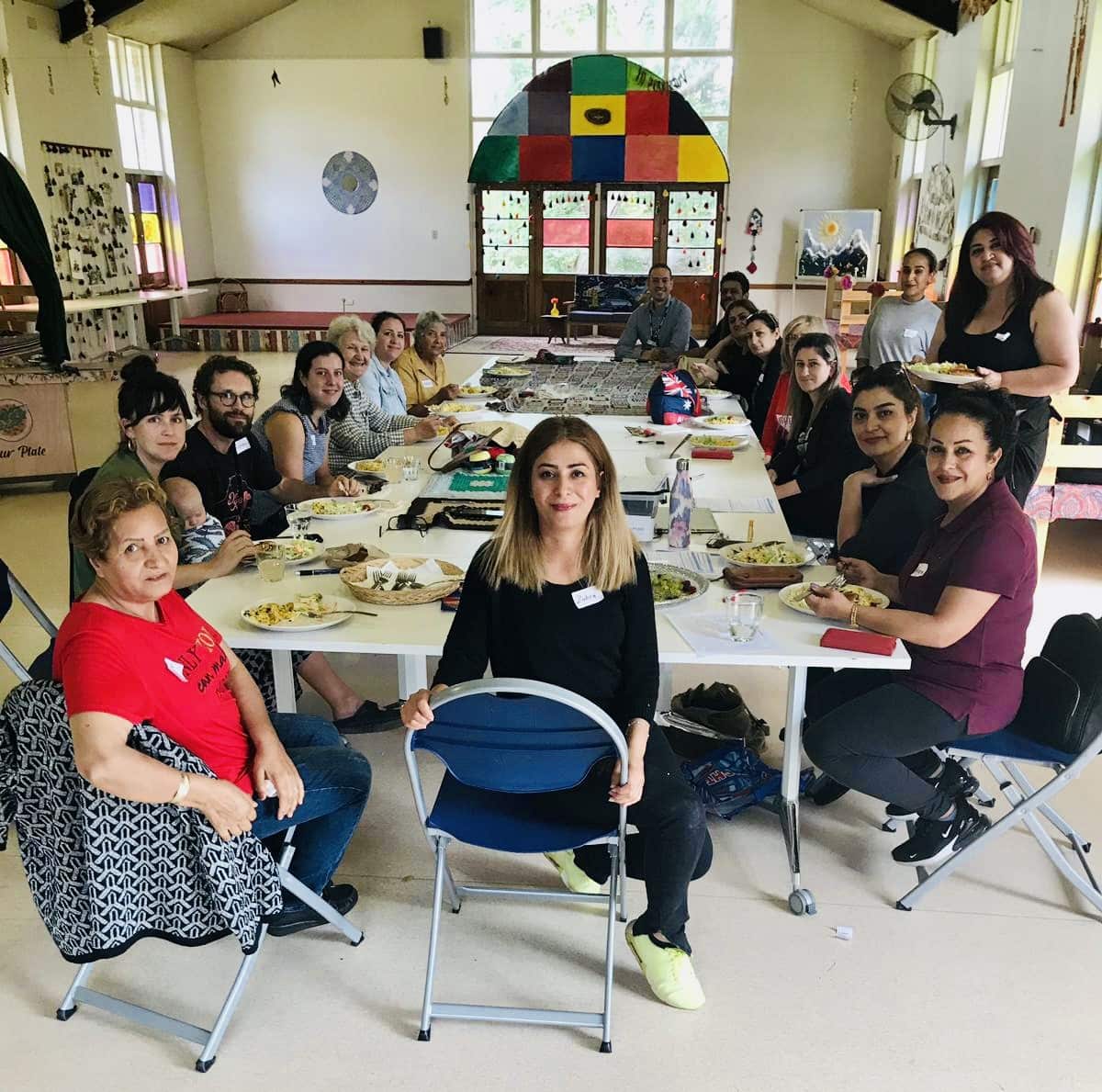 The group connects over a meal together.