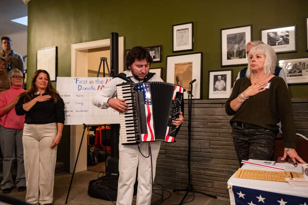 A musician plays the accordion. 