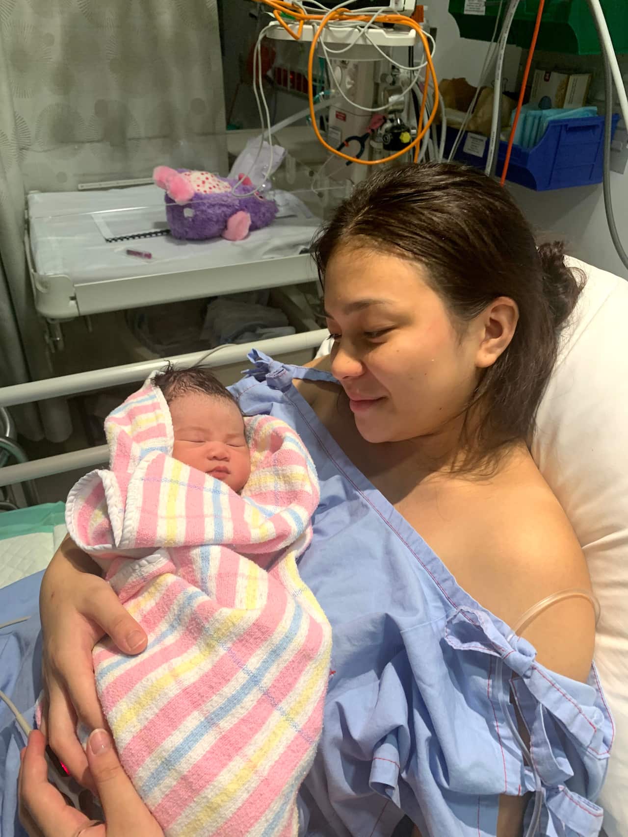 Vianne Biala and newborn daughter, Kira.