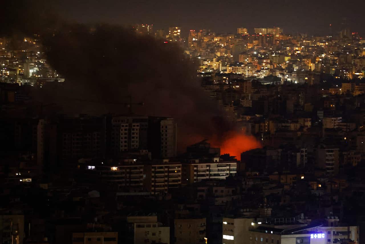 Smoke rises from areas targeted by an Israeli airstrike in Beirut