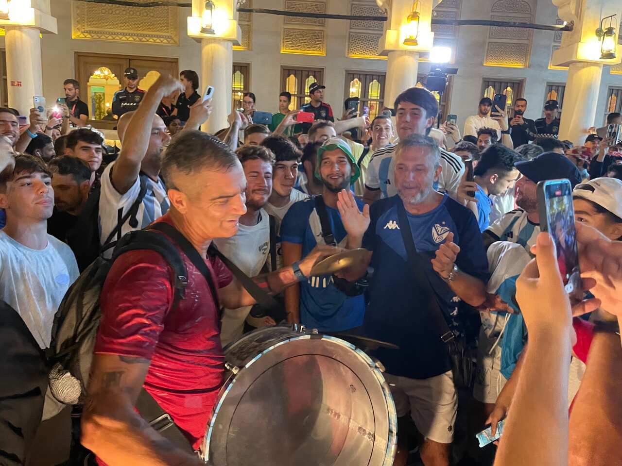 Argentinian fans celebrate the World Cup results, using drums to sing, dance and clap their emotions. 