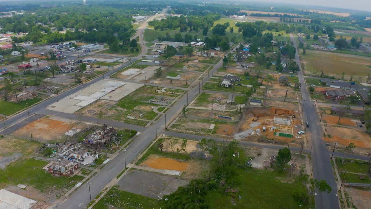 An aerial image of the city of Mayfield showing destruction of houses and buildings.
