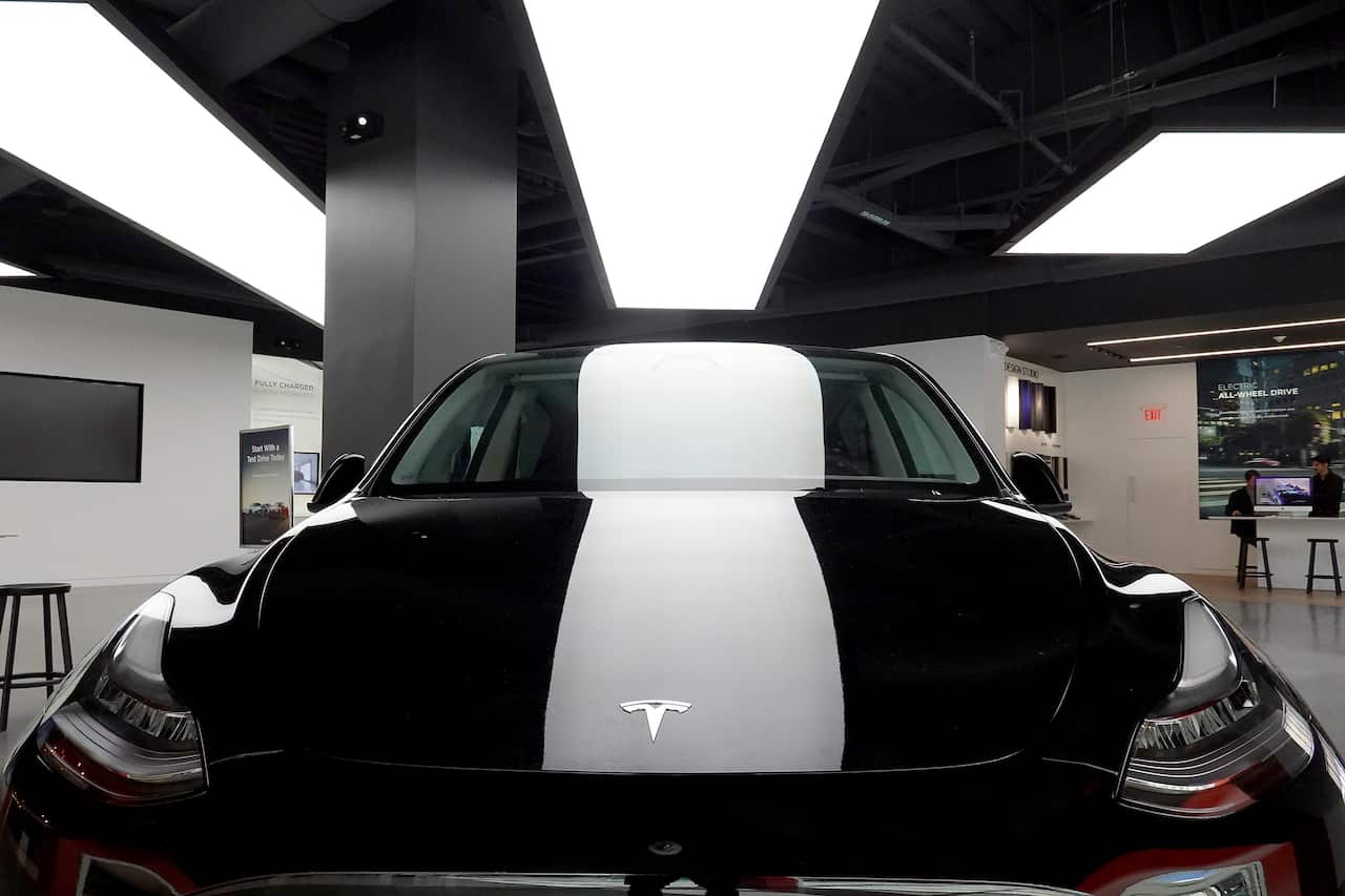 A close up of a Tesla vehicle's bonnet.