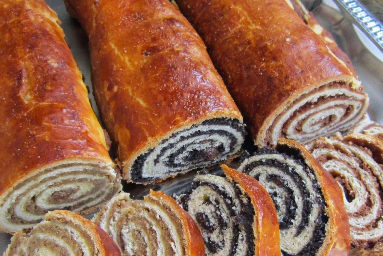 Three rolls of pastry with different coloured filling