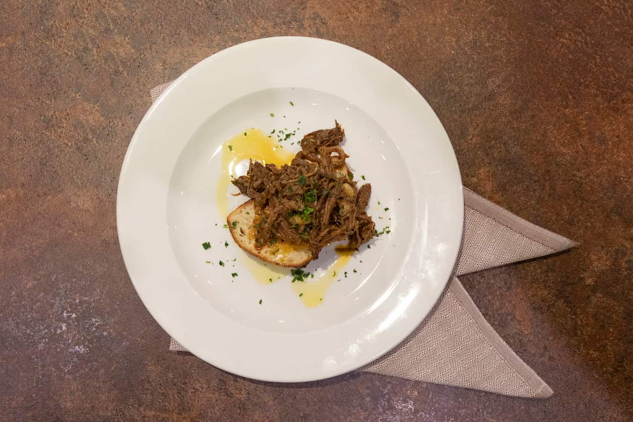 Beef Brisket, Stewed on toasted bread