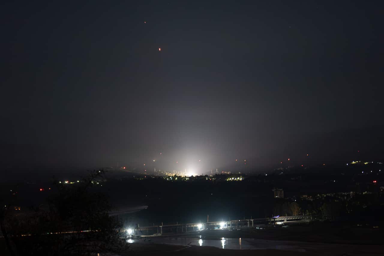 A streak of light seen in the sky.