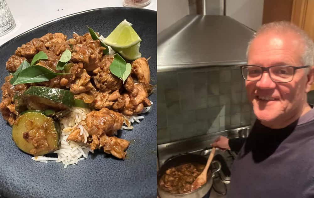 A man cooks a dish in a pot (right). A picture of the dish is next to him. 