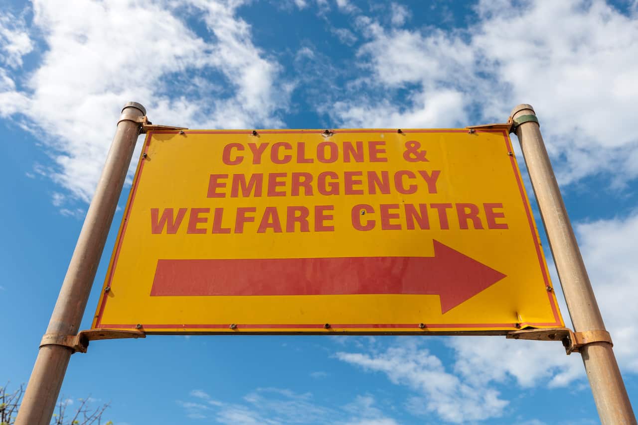 A cyclone emergency sign