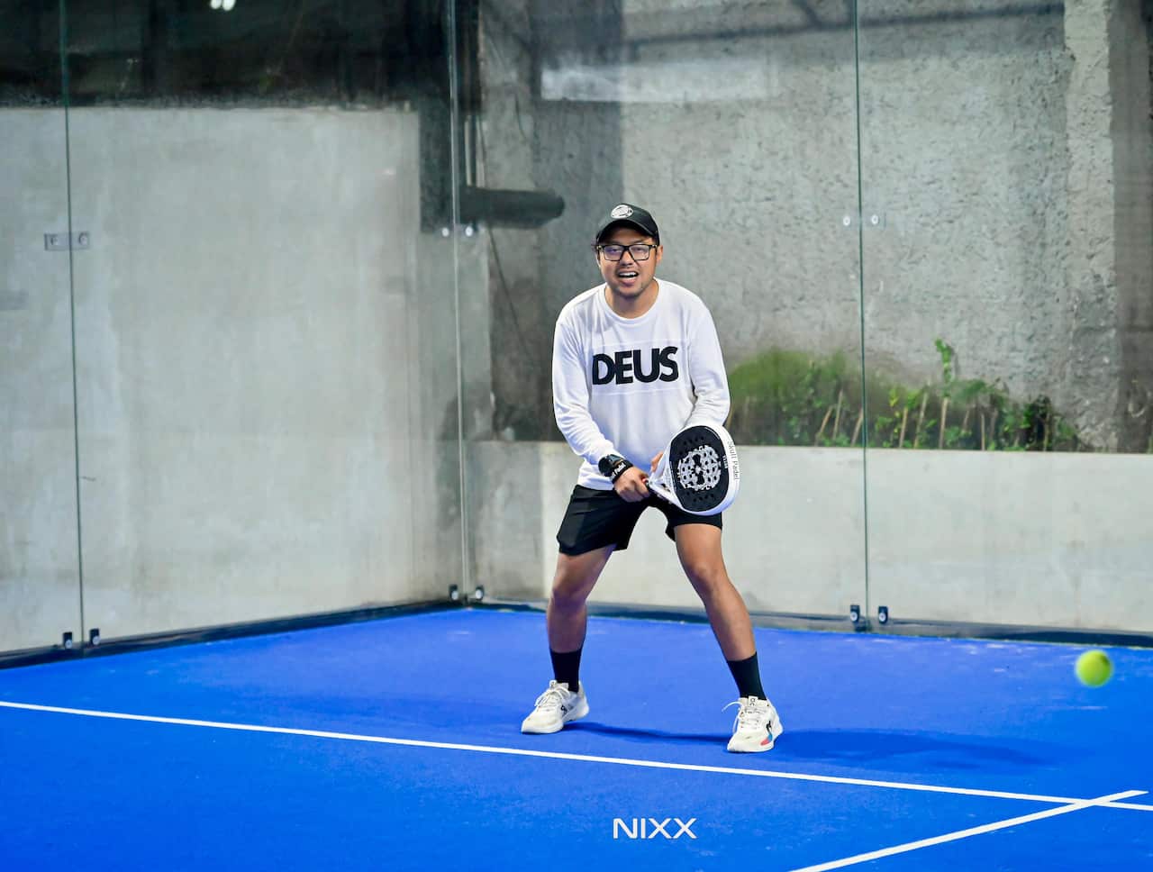 Padel coach Danishworo Budisatrio at a padel court.