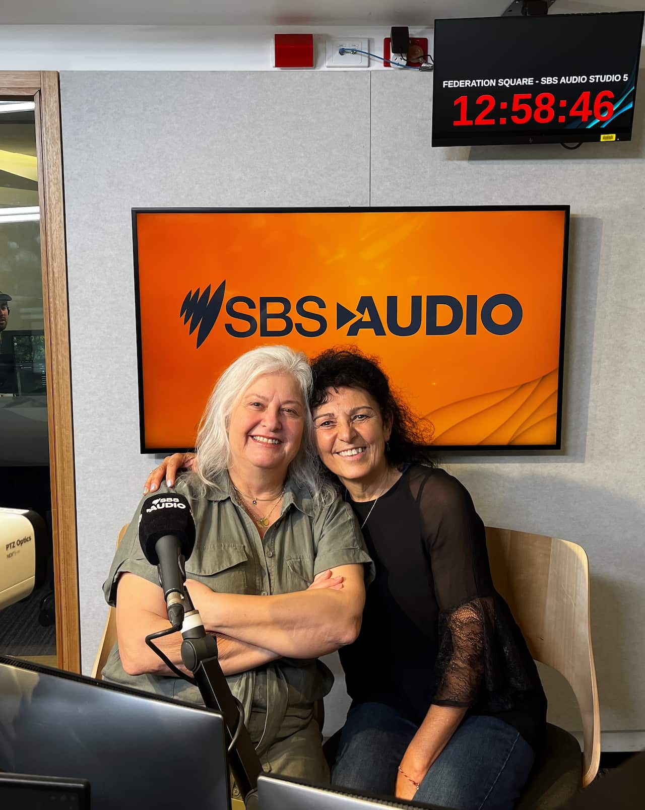 Musician and singer Irine Vela (left) and Achilles Yiangoulli's partner, choreographer and dancer Kathy Vlassopoulos at SBS Melbourne Studios
