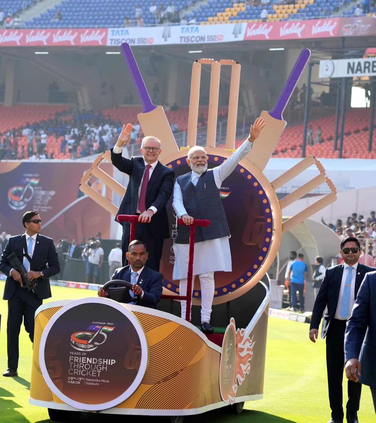 Indian Prime Minister Narendra Modi with his Australian counterpart Anthony Albanese wave as they arrive in the stadium to watch fourth cricket test match between India and Australia in Ahmedabad, India, Thursday, March 9, 2023. 