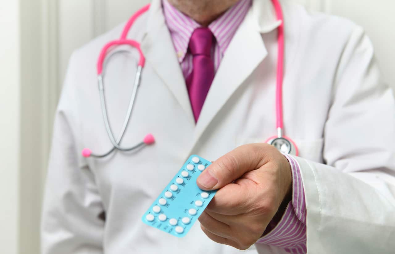 Doctor advising about birth control pills