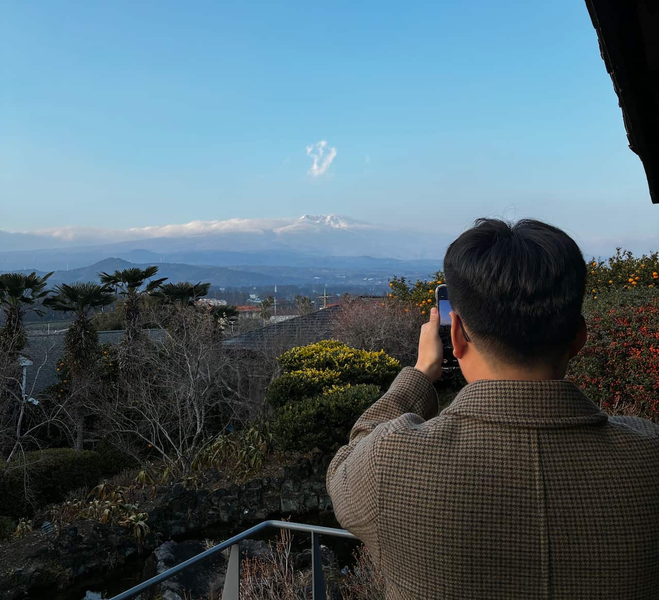 A young man takes photos in South Korea.