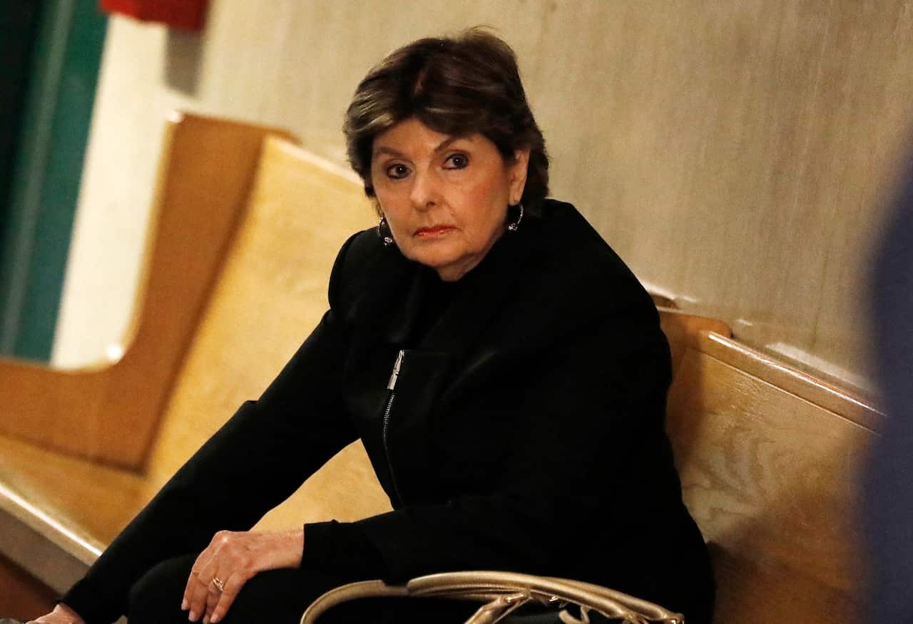 A lawyer waits in court.