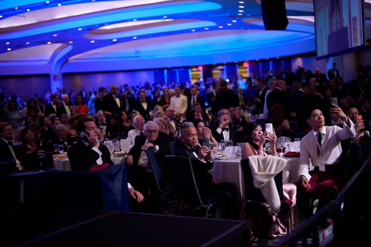 Members of the audience listen at the White House Correspondents' dinner.