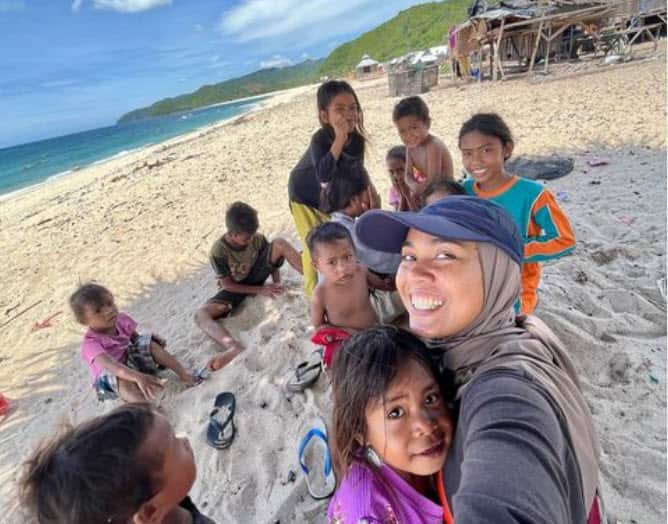 Mimi The campervan girl with some local children