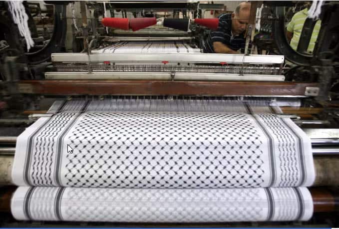 The black and white keffiyeh has a deeper meaning connected to Palestinian culture.jpg