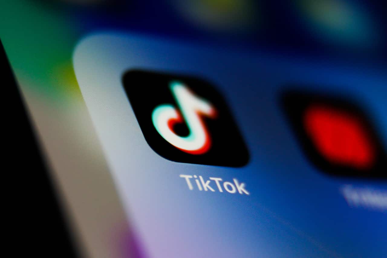 The TikTok app icon on a smartphone screen.