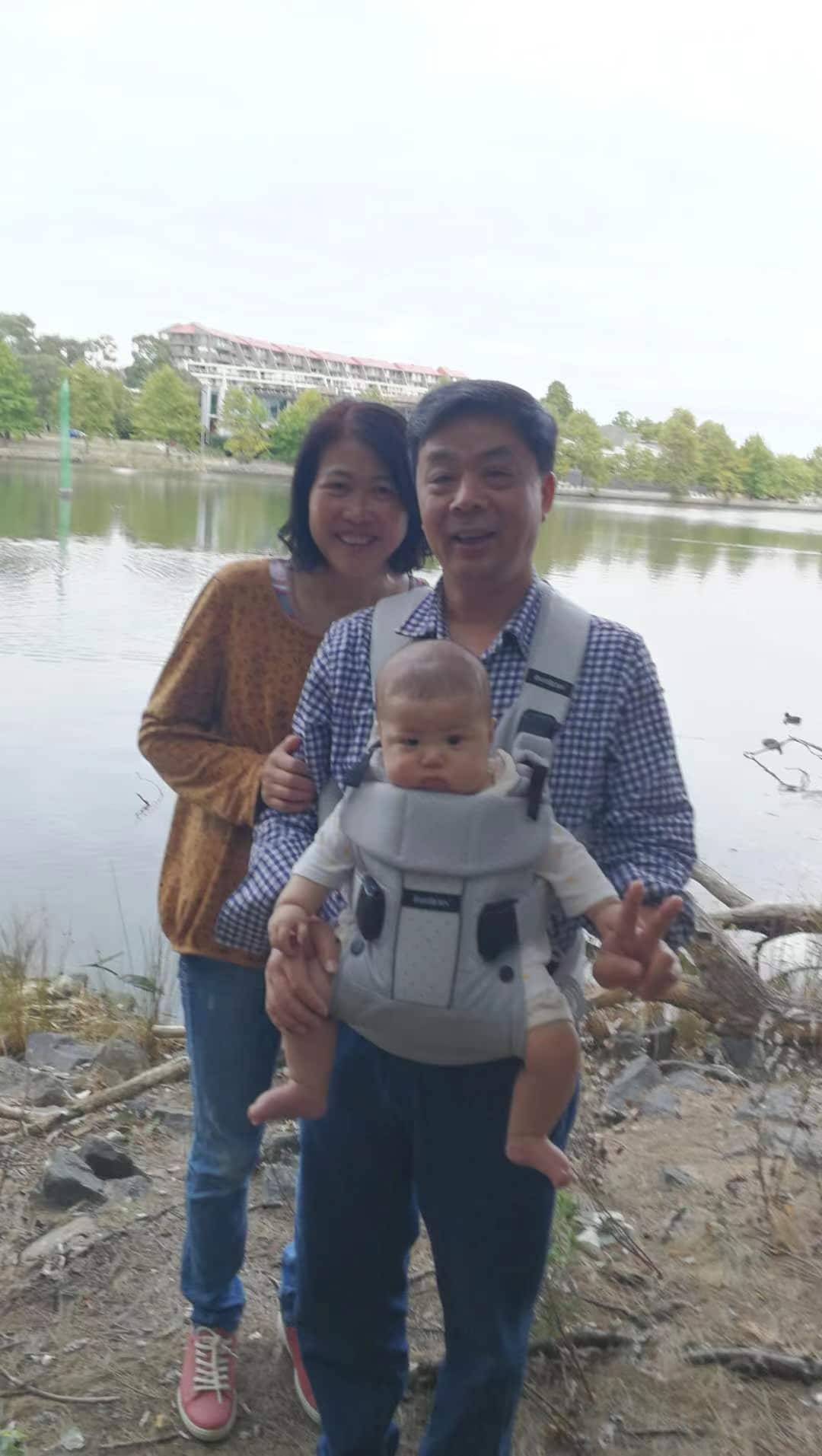 Rong Cai and Xinping Zhang and grandson Ivan.