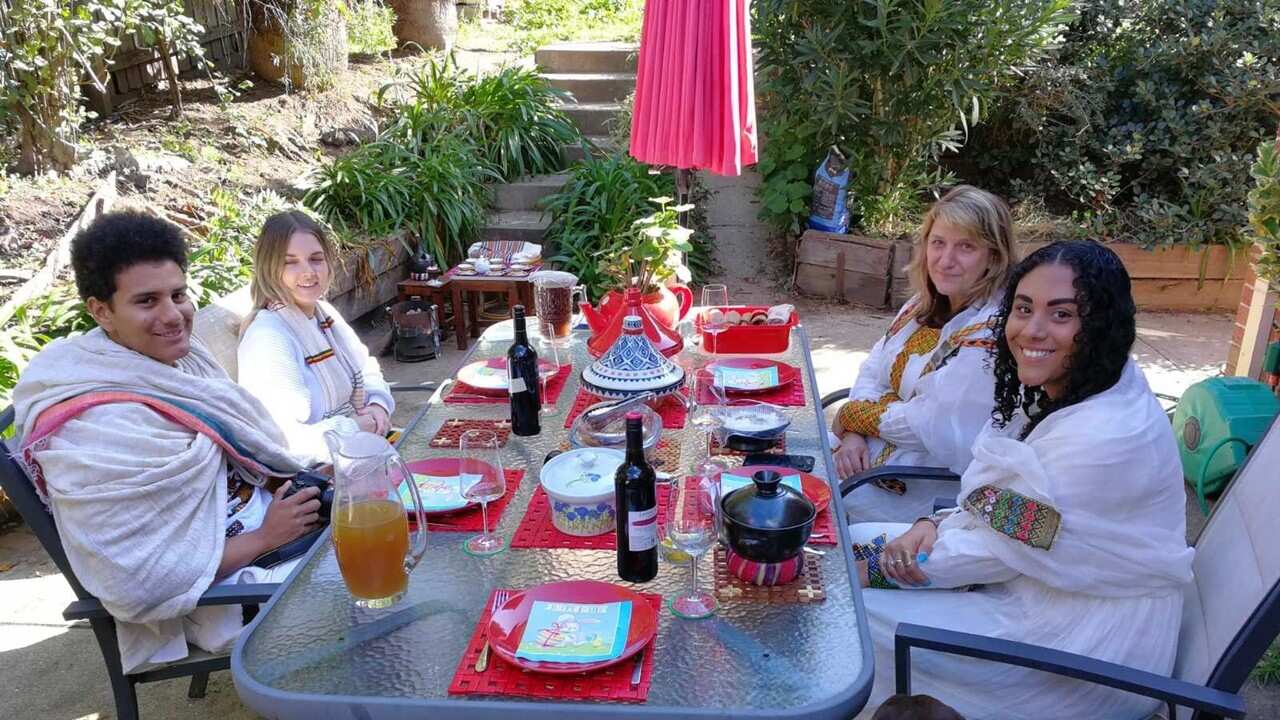 Muluget's wife, children, a family friend jpg