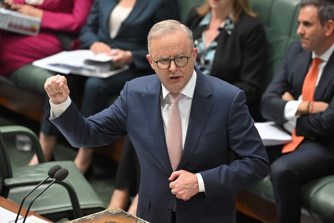 A man delivers a speech in parliament. 
