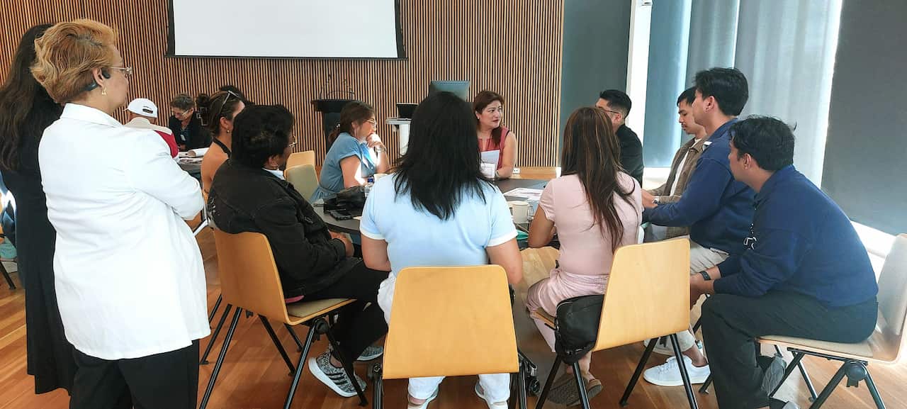 Dixie Morante hepls facilitate discussion at QUT Brisbane.jpg