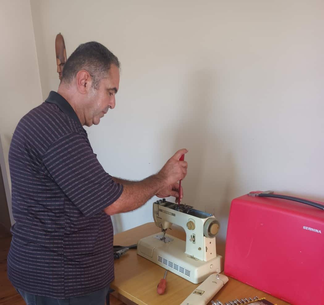 Atheer with sewing machines 2.JPG