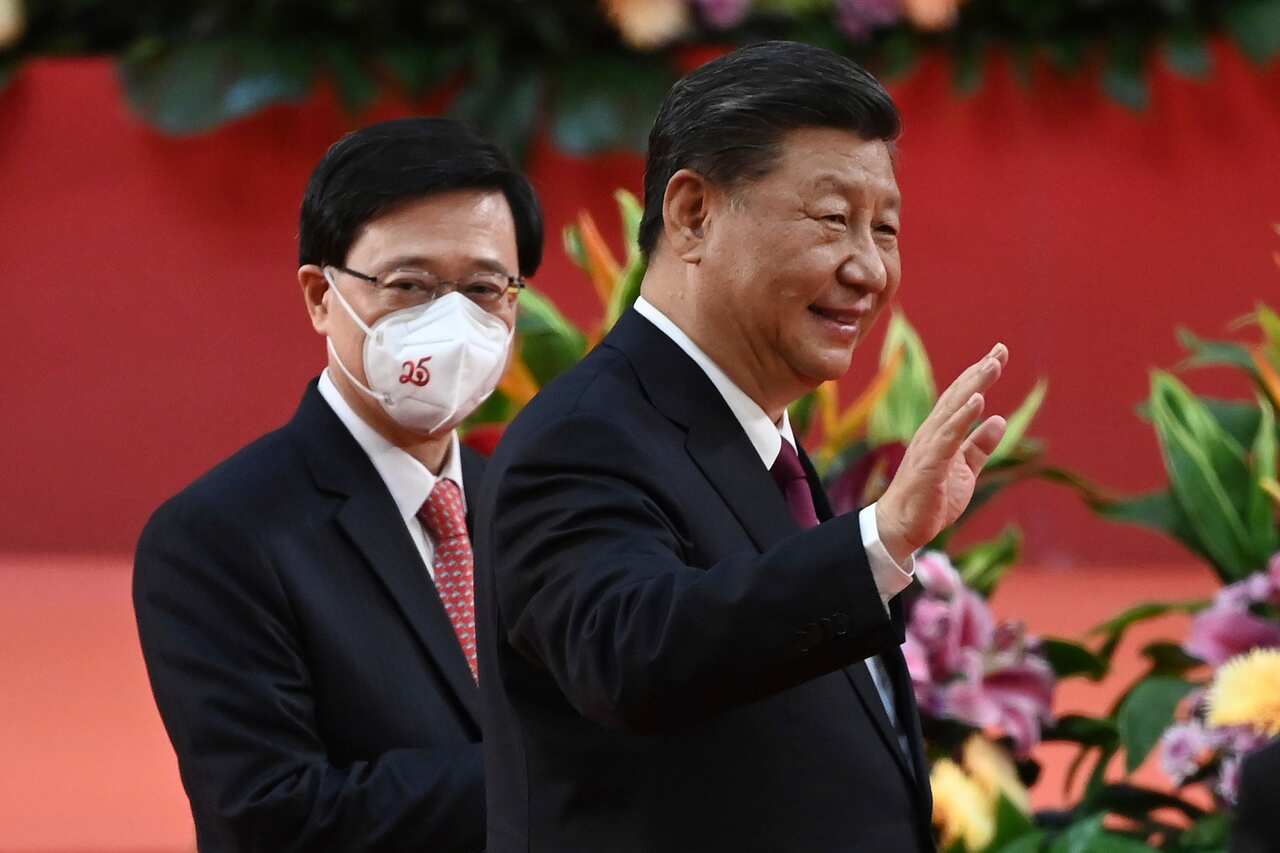 A photo of Hong Kong's Chief Executive John Lee with China's President Xi Jinping.