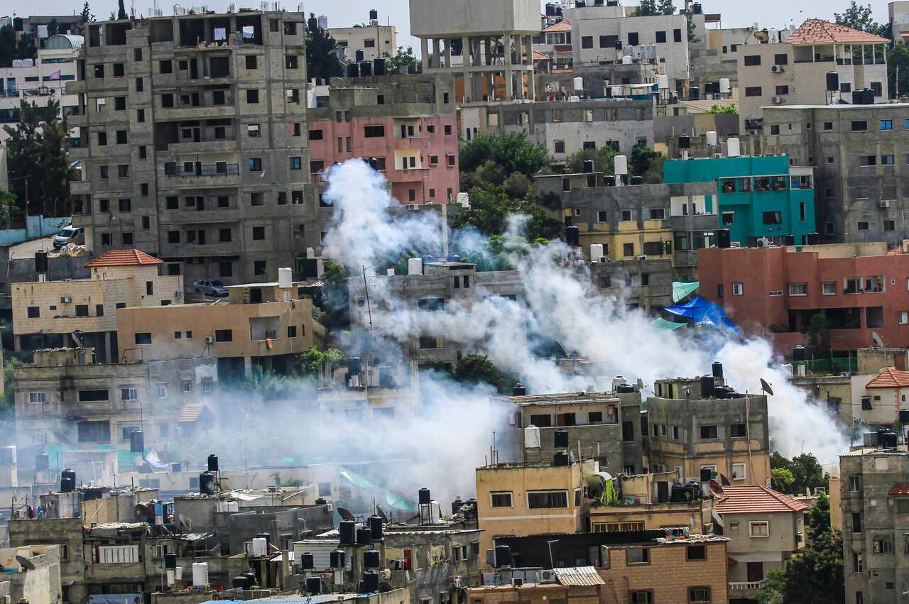 Smoke coming from a dense residential area.