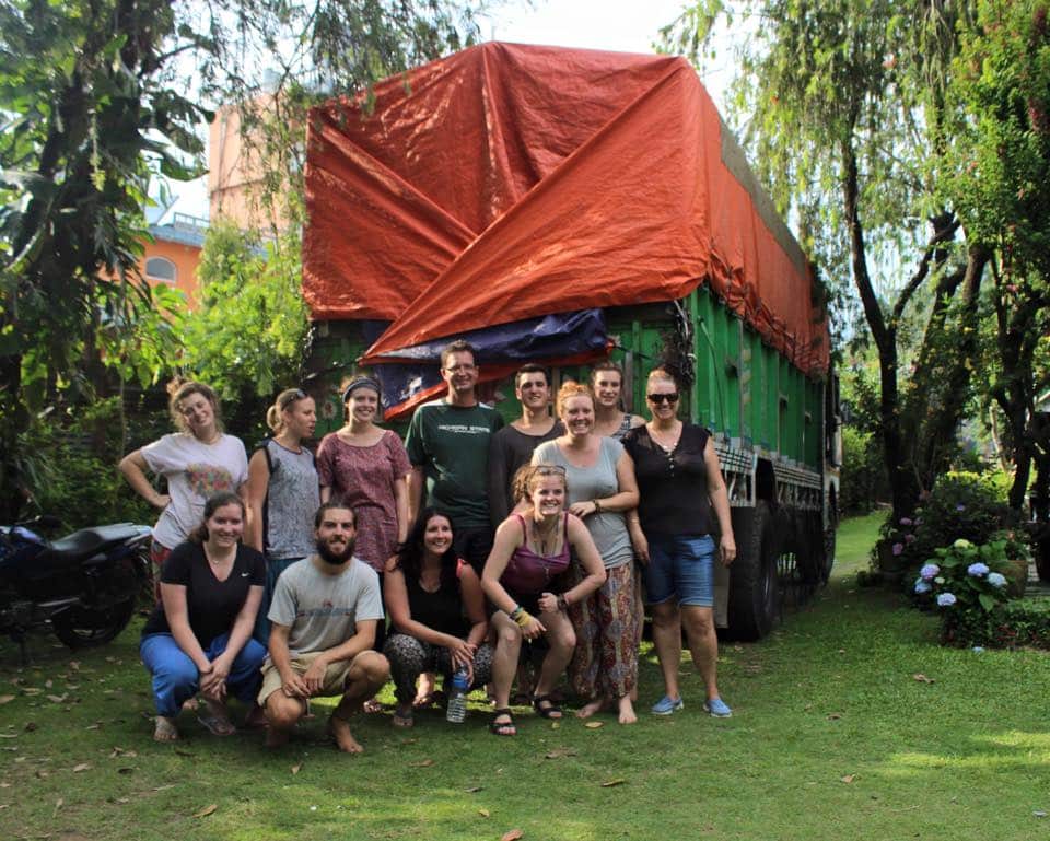 Tys Occhiuzzi (top, fourth from the right) volunteering in Nepal during the time after the earthquake in 2015.