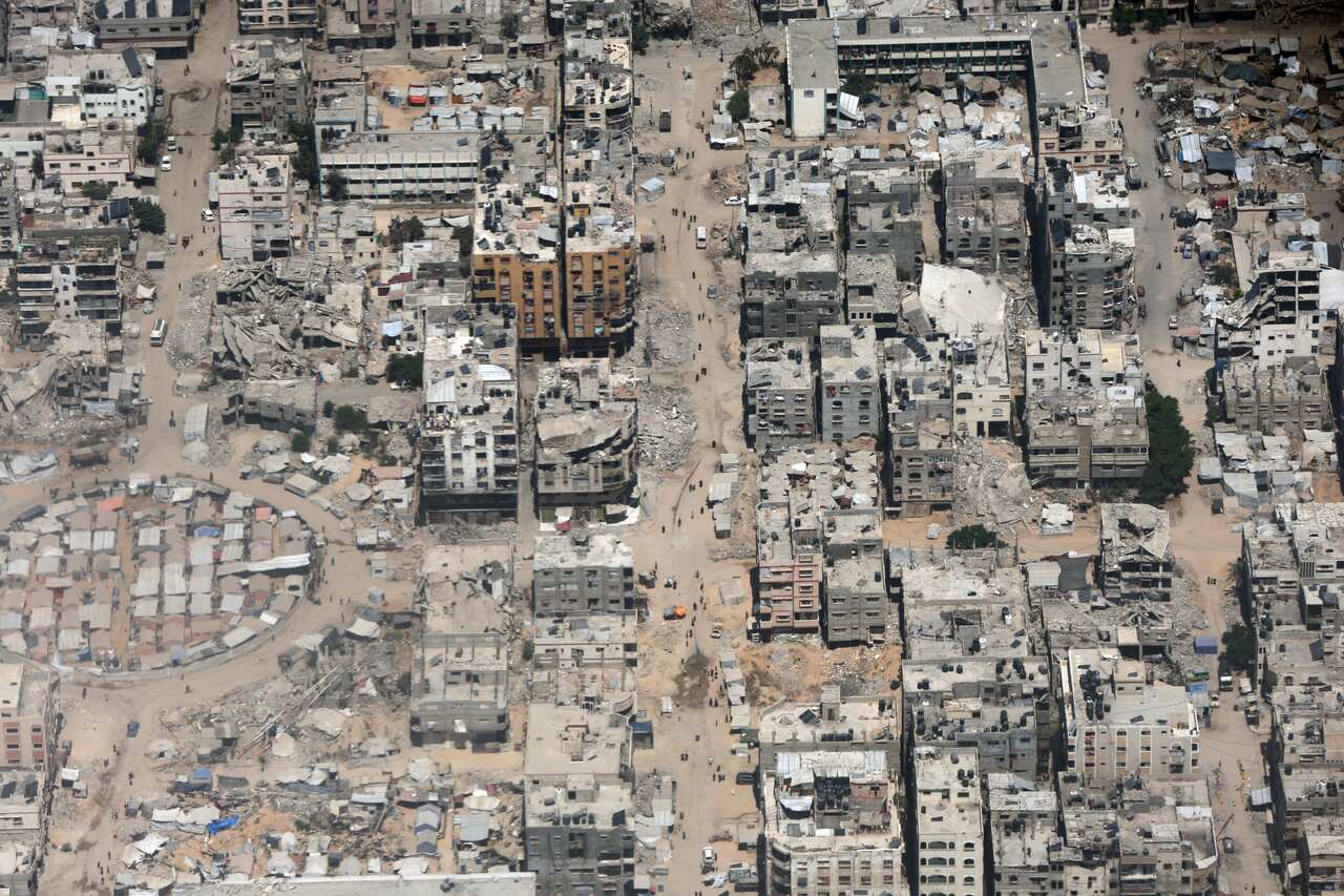 An aerial view of streets with damaged and destroyed buildings in the Gaza Strip