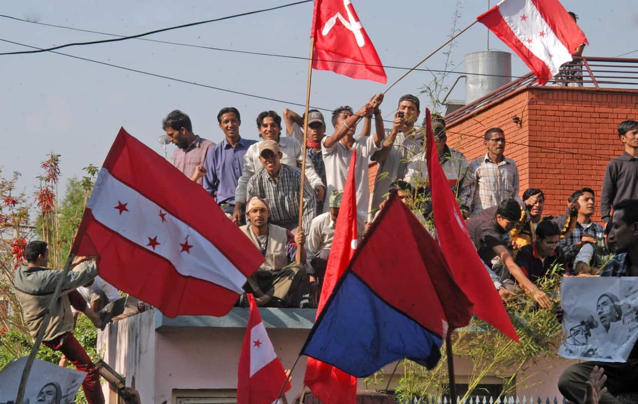 FILE: Nepalese pro-democracy supporters gather at an opposition party meeting venue in Kathmandu on Tuesday, 25 April 2006.