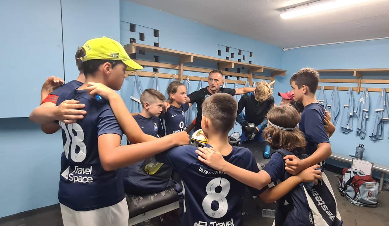 Founder of the Ultra Football Academy Velibor Jokovic and one of his talented teams  