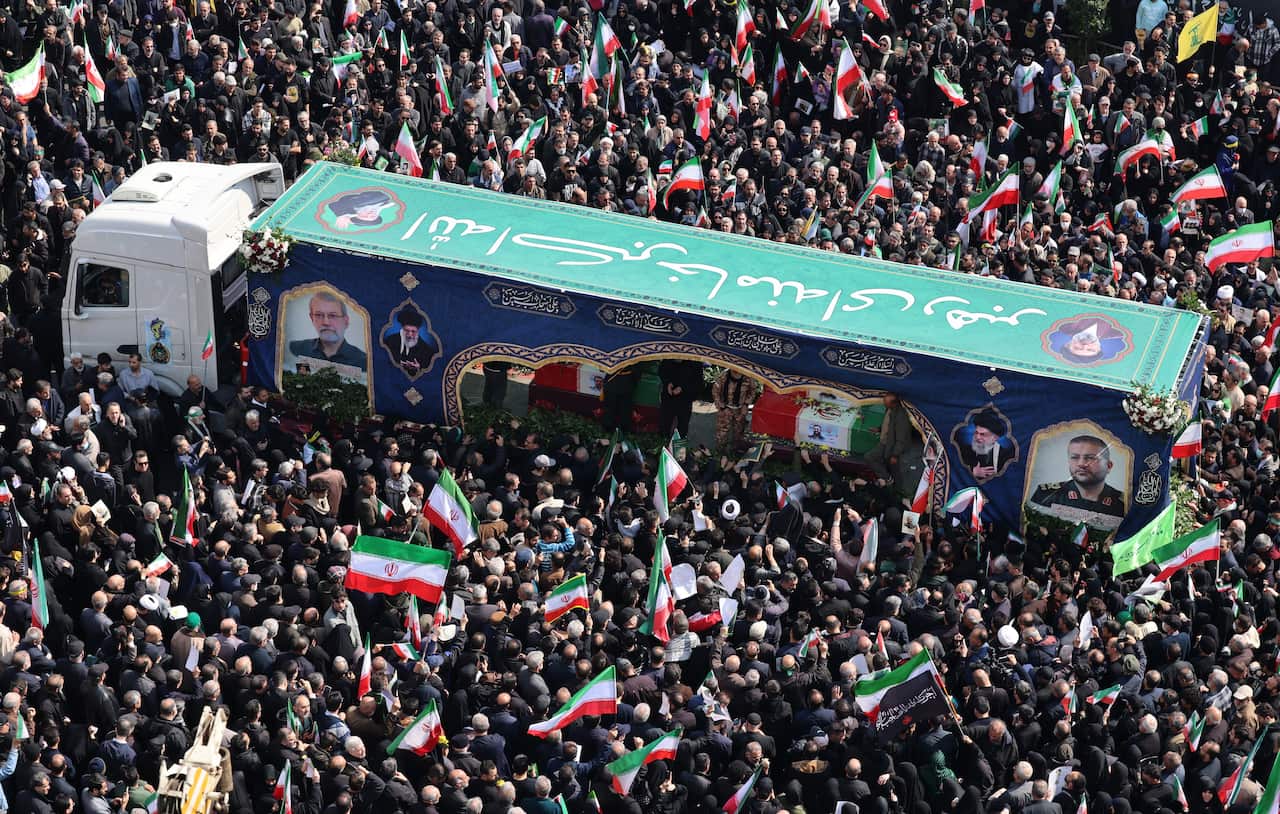 Tehran holds funeral for security chief Larijani and Basij leader Soleimani