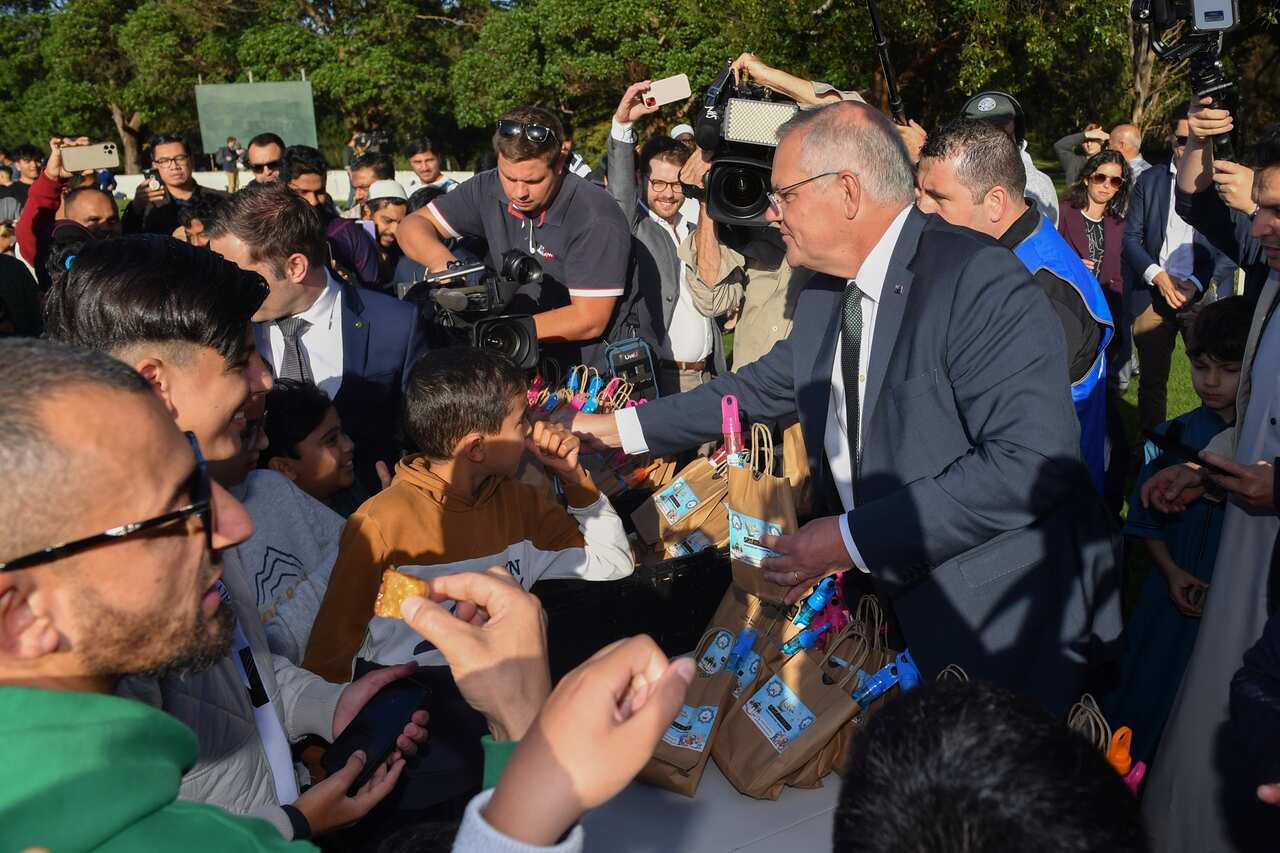 A man in a suit in a crowd of people