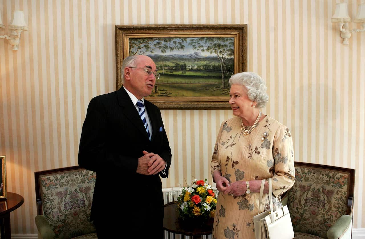 John Howard speaking with Queen Elizabeth II