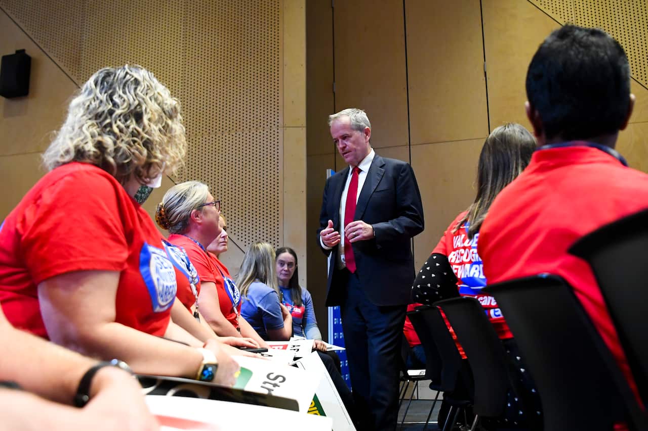 Shadow Minister for the NDIS, Bill Shorten, speaking to people in a room