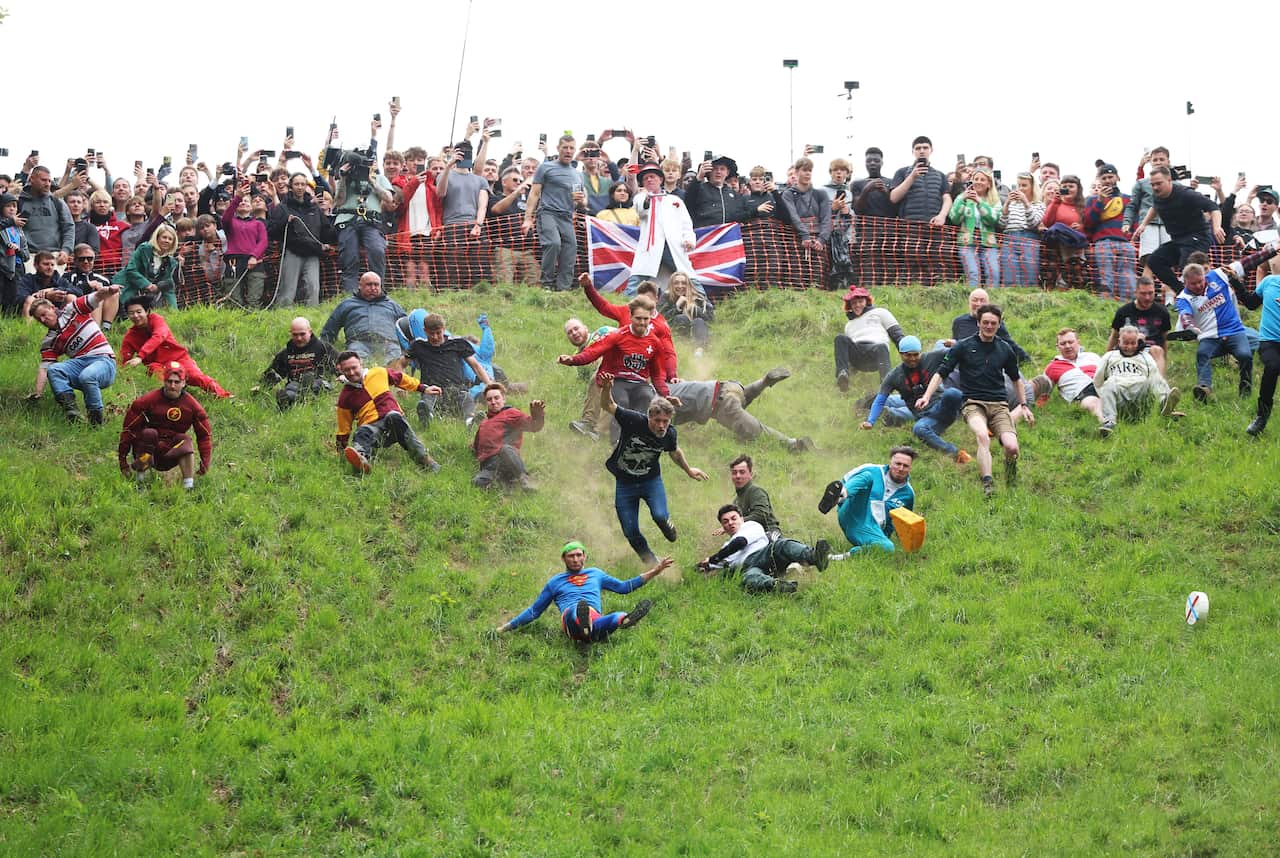Annual Cooper's Hill Cheese-Rolling Event Takes Place In Gloucester
